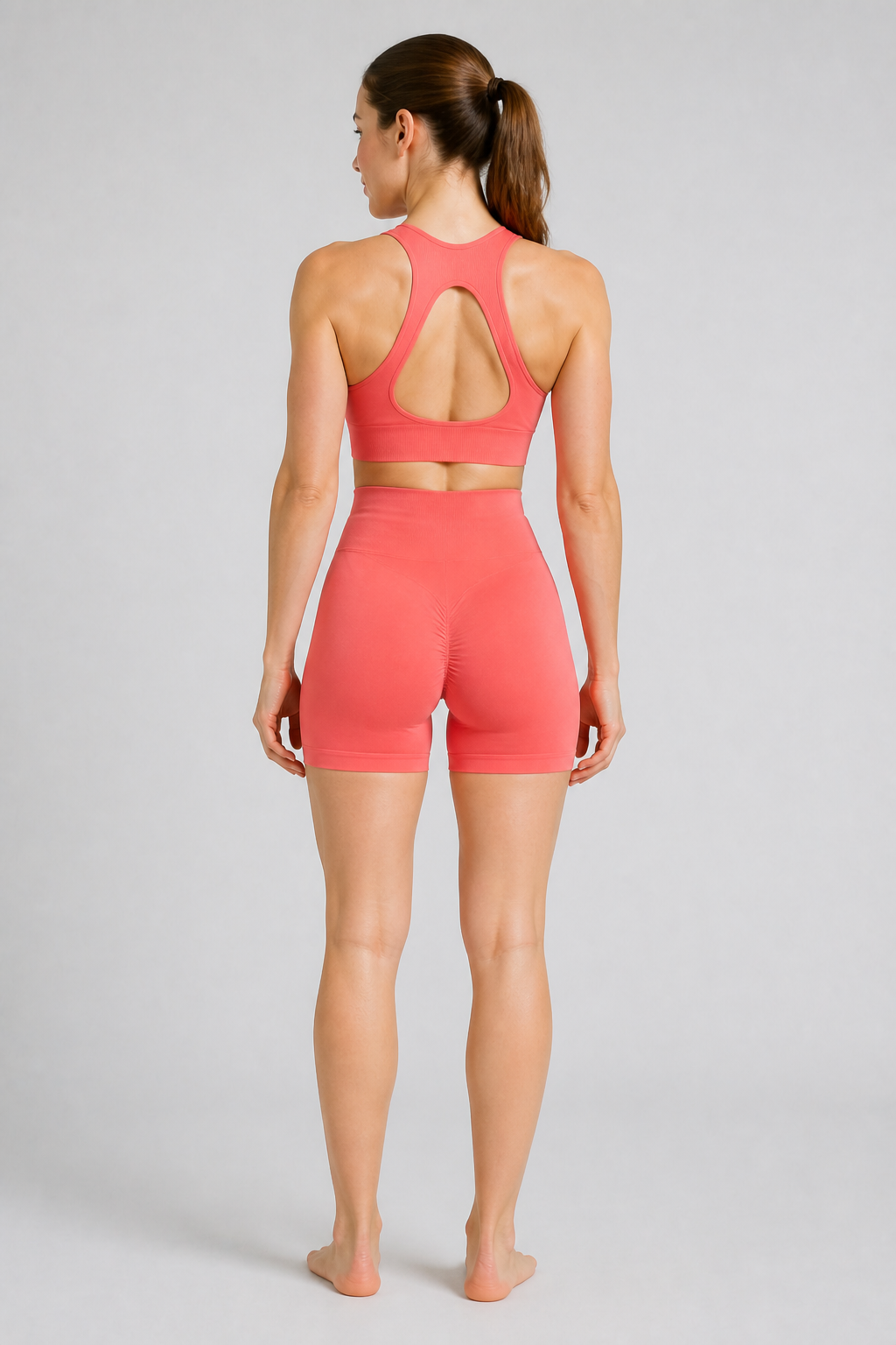 Form High-Waist Hold Shorts - Coral Pink - rear closeup | color:coral pink